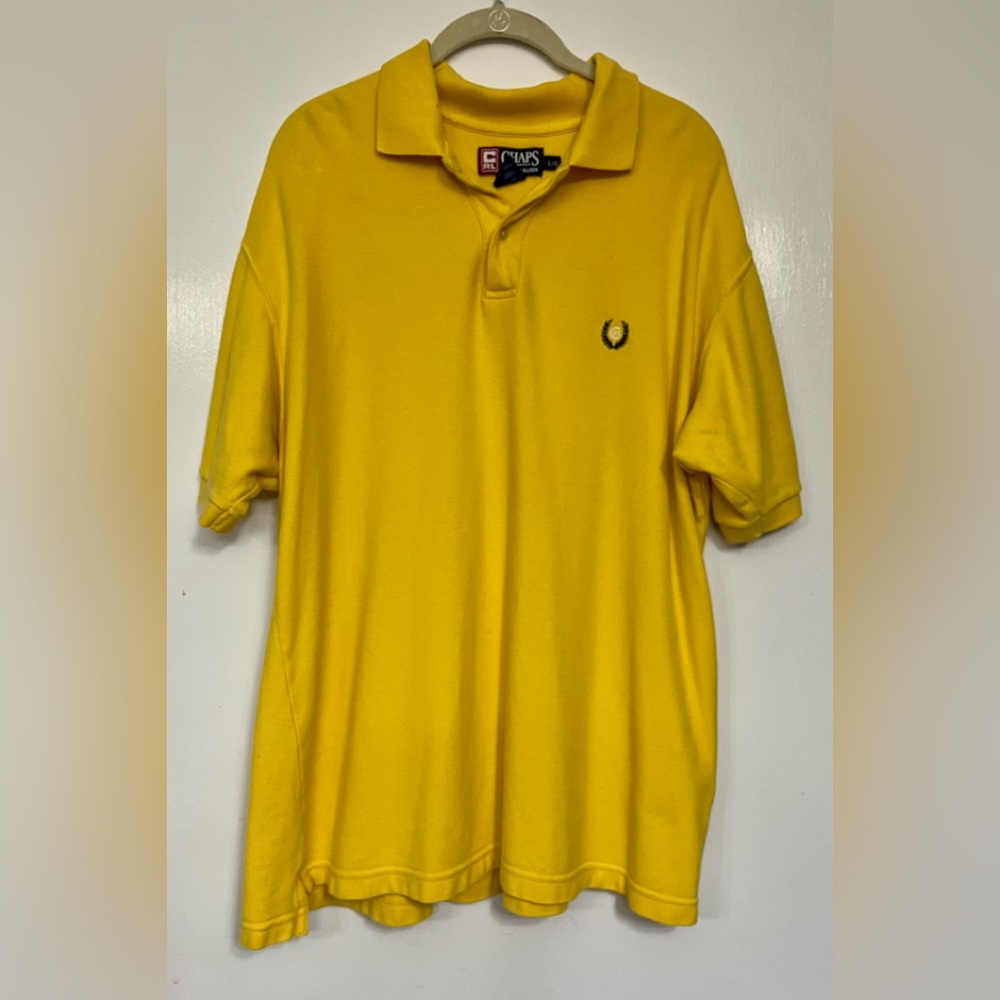 Chaps short sleeve knit 3 buttoned shirt. Color is a Golden yellow.